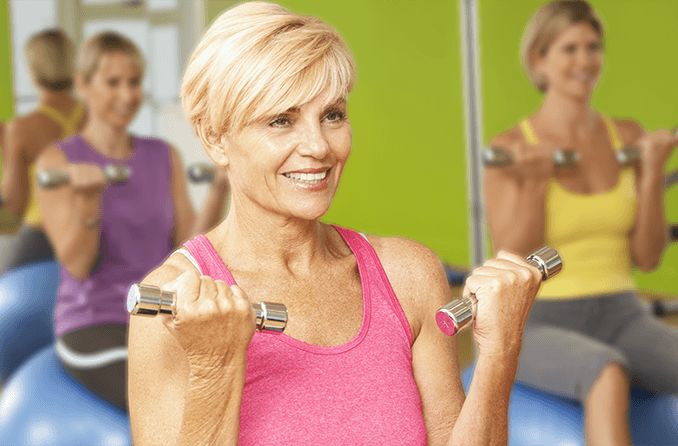 middle-age woman exercising without glasses